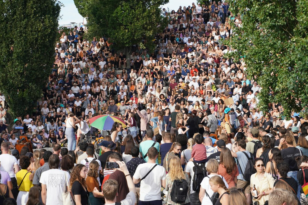 Young festival goers queuing for tickets at Roskilde Festival