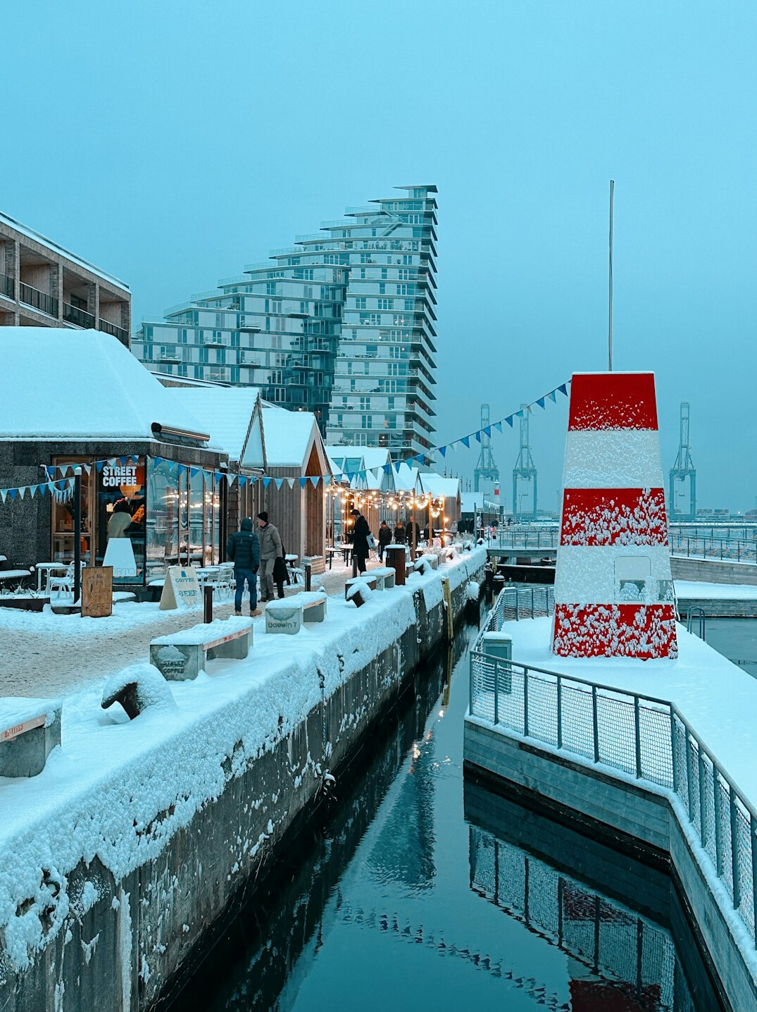 Visitors queuing at a Christmas market stall in Aarhus, Denmark